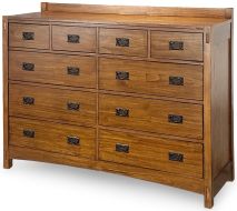 The Solid Mindi Wood Mission Hills 10 Drawer Dresser is crafted from wood with a natural finish and features ten drawers with black metal handles, arranged in multiple rows.