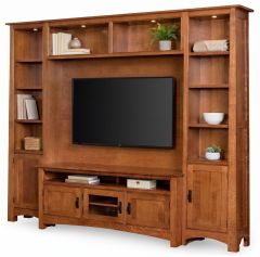 The California Made Solid Quartersawn Oak Wood High Performance Television Sierra Vista 84″ High Wall Unit features shelves for books, plants, and decor plus cabinets, a mounted TV, and a natural wood finish.
