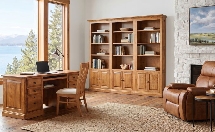 Home office inspiration with wood desk, bookcase, and lounge chair